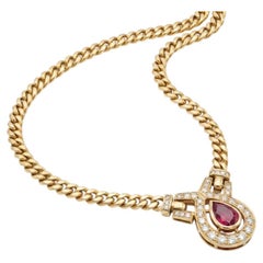 18K Gold Pear Shape Ruby Diamond Necklace with Round and Baguette Diamonds