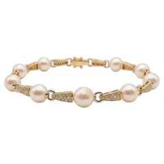 Pulsera de eslabones de oro de 18 quilates con perlas y pavé de diamantes