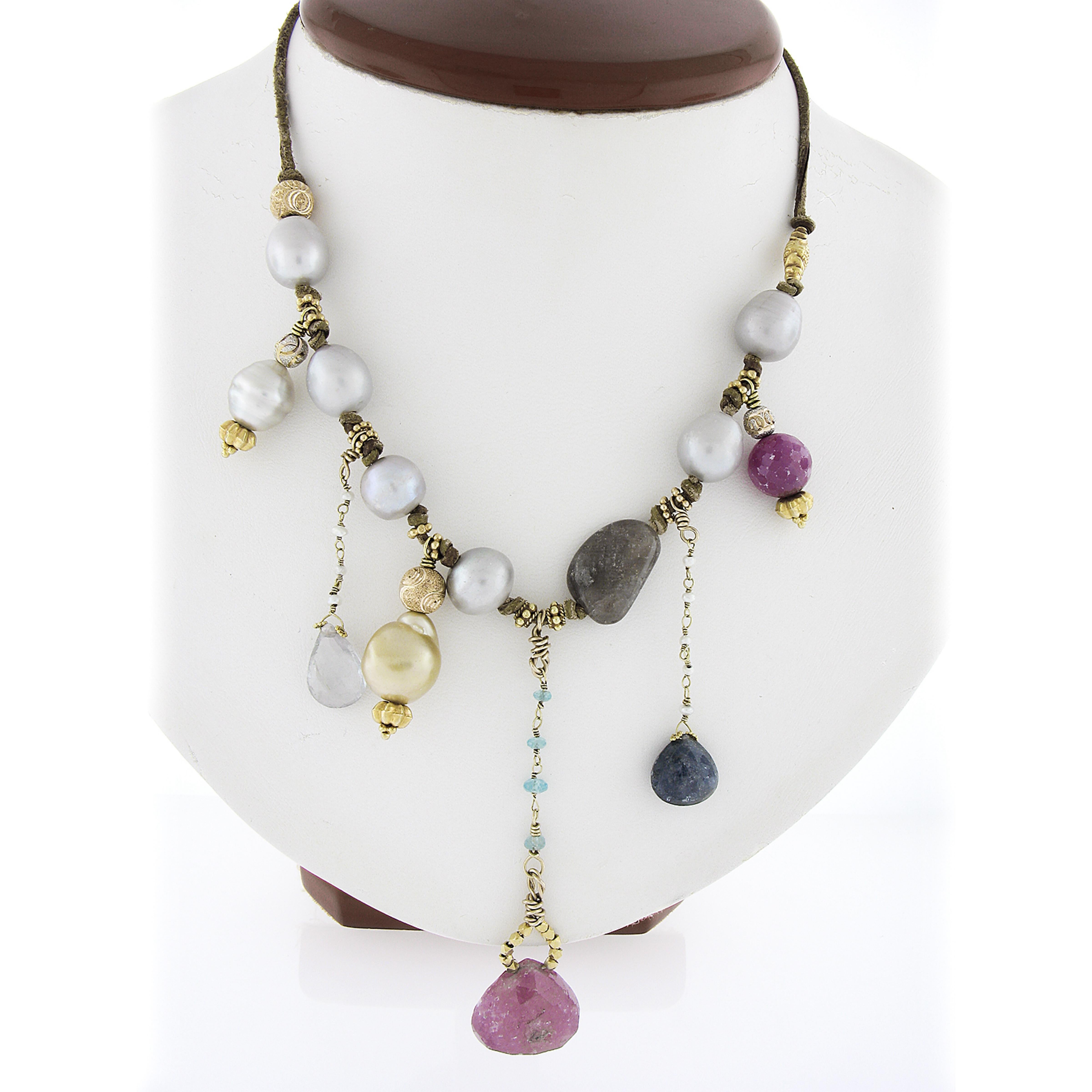 --Stone(s):--
Numerous Genuine Cultured Pearls & Natural Genuine Gemstones - Multi Shapes- Strung Set - Multi Colors

Material: 18k Yellow Gold Beads & Clasp w/ Leather Cord
Weight: 36.41 Grams (gross)
Chain Type: Dark & Light Brown Leather
