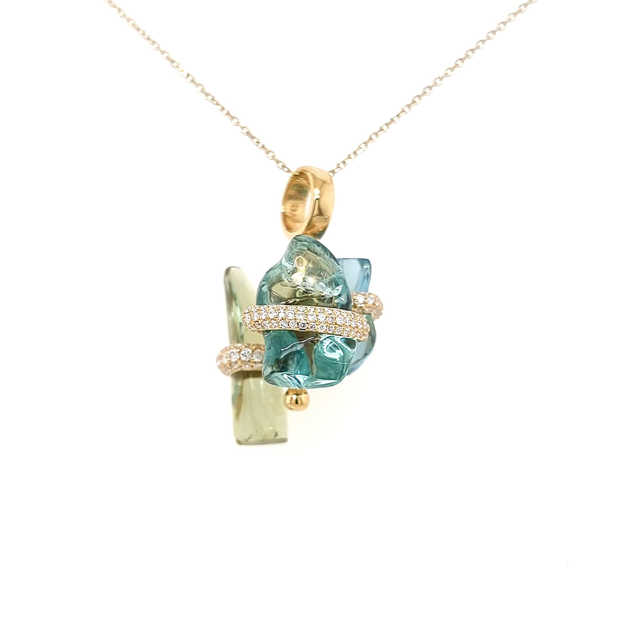 Organic collection by VOTIVE.

Introducing VOTIVE's exquisite Organic collection, featuring a captivating 18K yellow gold pendant adorned with lustrous white diamonds, uncut tanzanite, and uncut blue sapphire gemstones. The pendant's natural and