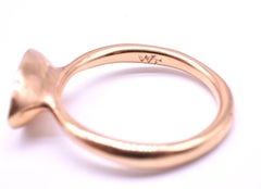 Antique 18 Karat Gold and Peridot Lens Shaped Ring, c.1920