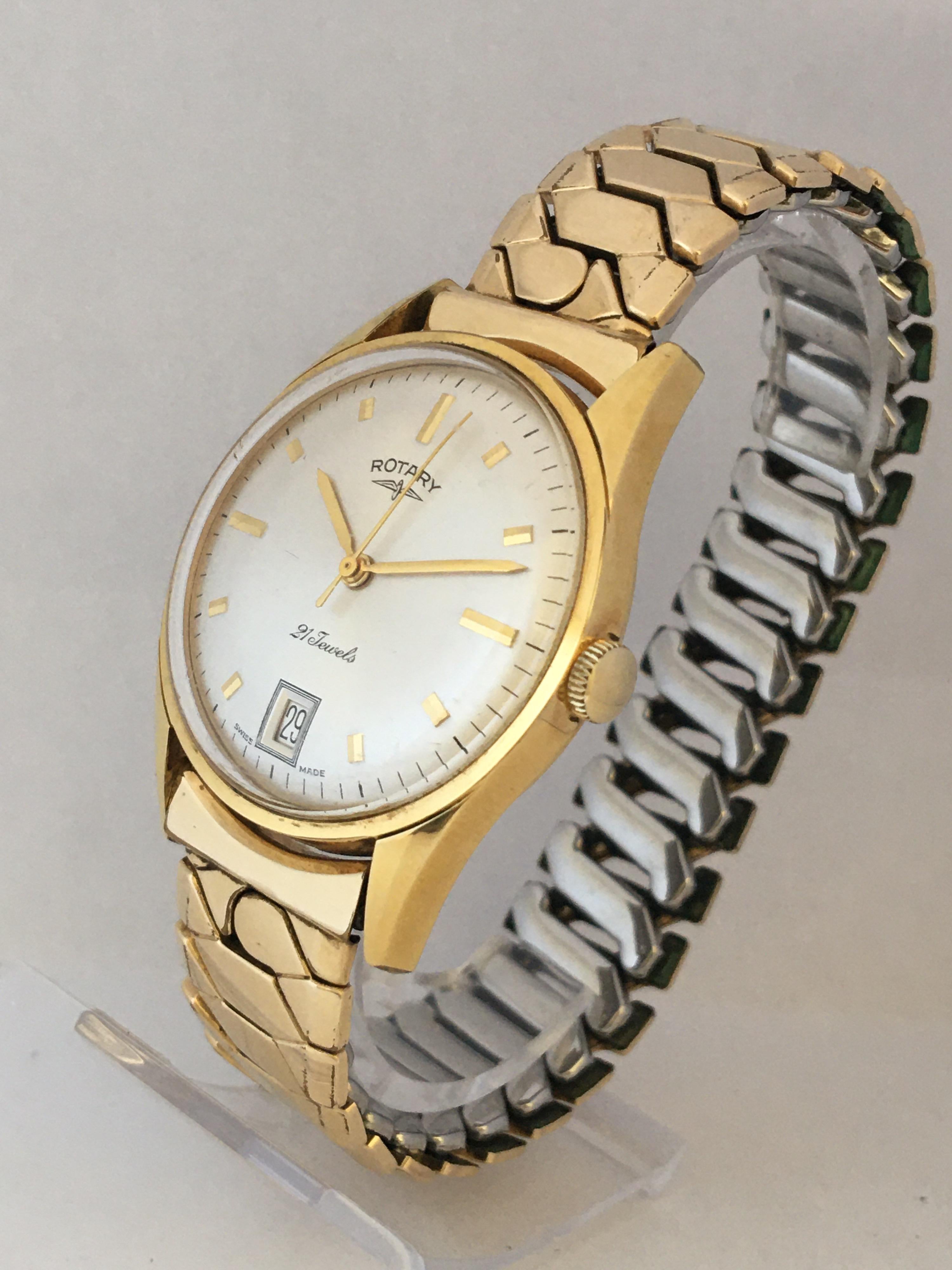 This beautiful vintage pre-owned hand-winding Watch is working and it is ticking and running well.

Visible signs of ageing and gentle used with slight tarnishes on the 6 inches long 18K gold plated and stainless steel back flexible metal strap.