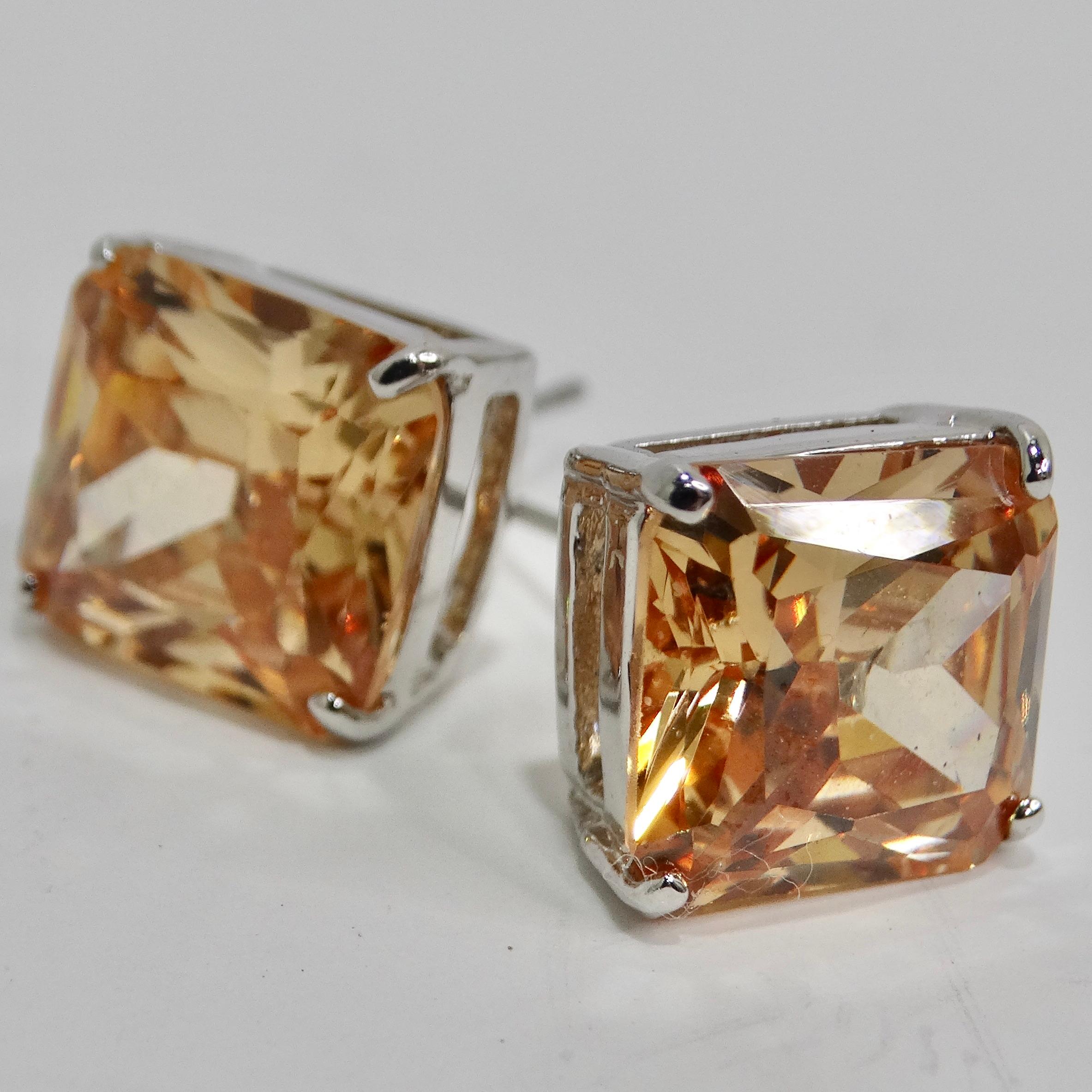 Introducing our stunning 18K Gold Plated Honey Swarovski Synthetic Crystal Stud Earrings, a classic and versatile addition to your jewelry collection. Approximately 5 carats each! These timeless stud earrings feature Swarovski emerald-cut crystals