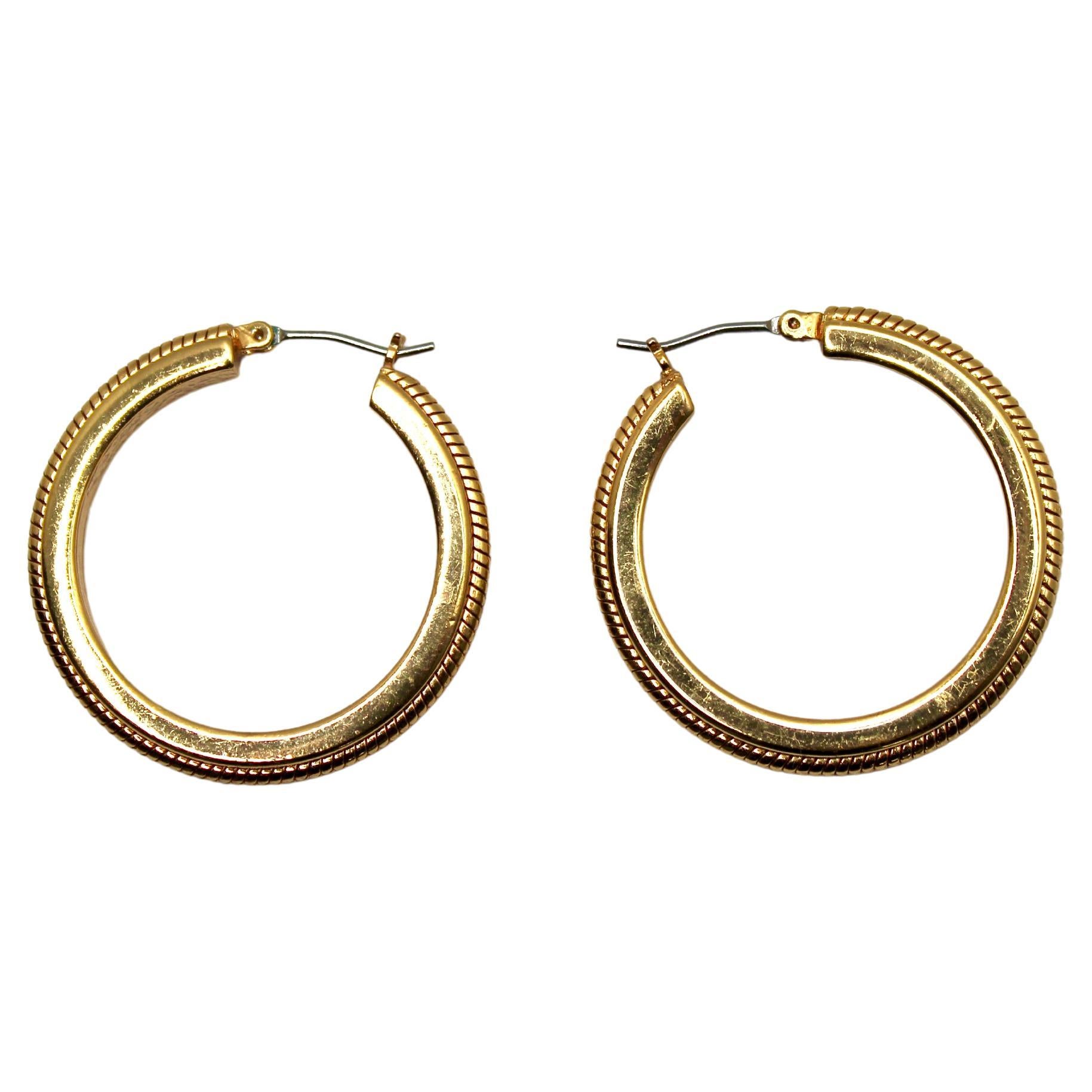 Orecchini a cerchio placcati in oro 18k, circa anni 
70