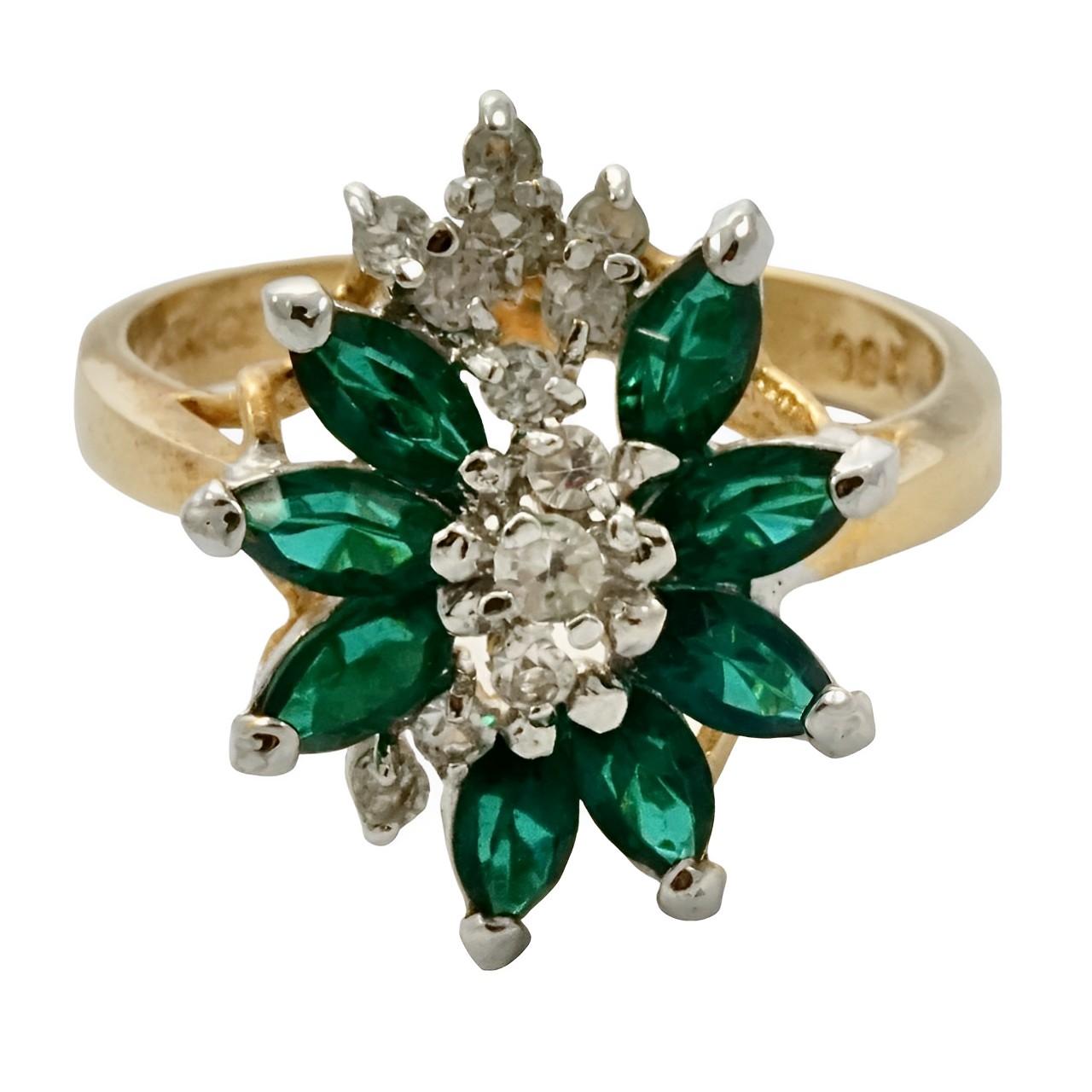 Beautiful 18K gold plated ring, set with marquise shape faux emeralds and round faux diamonds. Ring size UK Q / US 8, inside diameter 1.9 cm / .74 inch. Measuring 2 cm / .78 inch by 1.5 cm / .59 inch.

This lovely ring exudes timeless glamour.