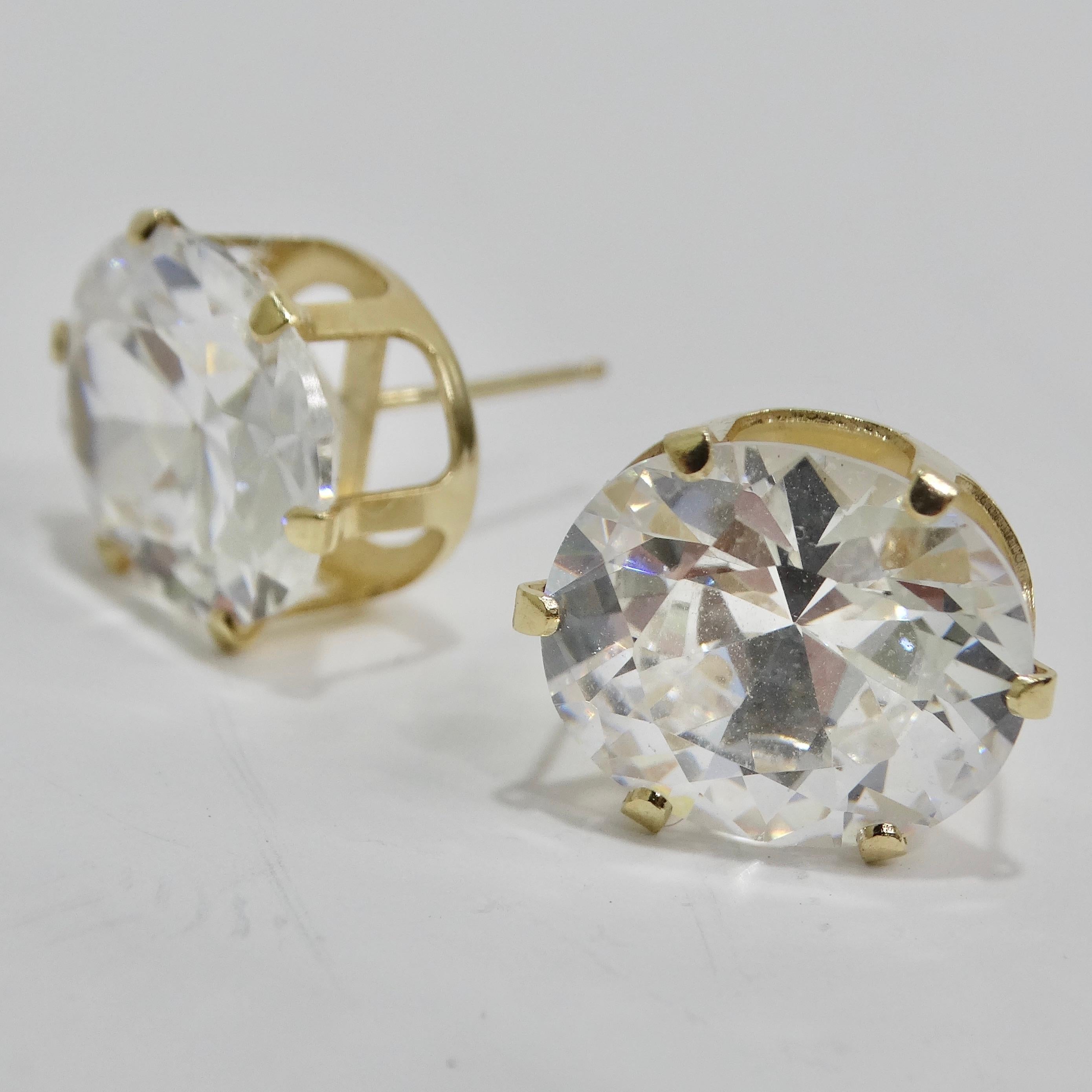 Introducing the exquisite 18K Gold Plated Swarovski Synthetic Round Emerald Cut Crystal Stud Earrings, a timeless and elegant addition to your jewelry collection. Approximately 4 carats each! Crafted with precision and adorned with Swarovski