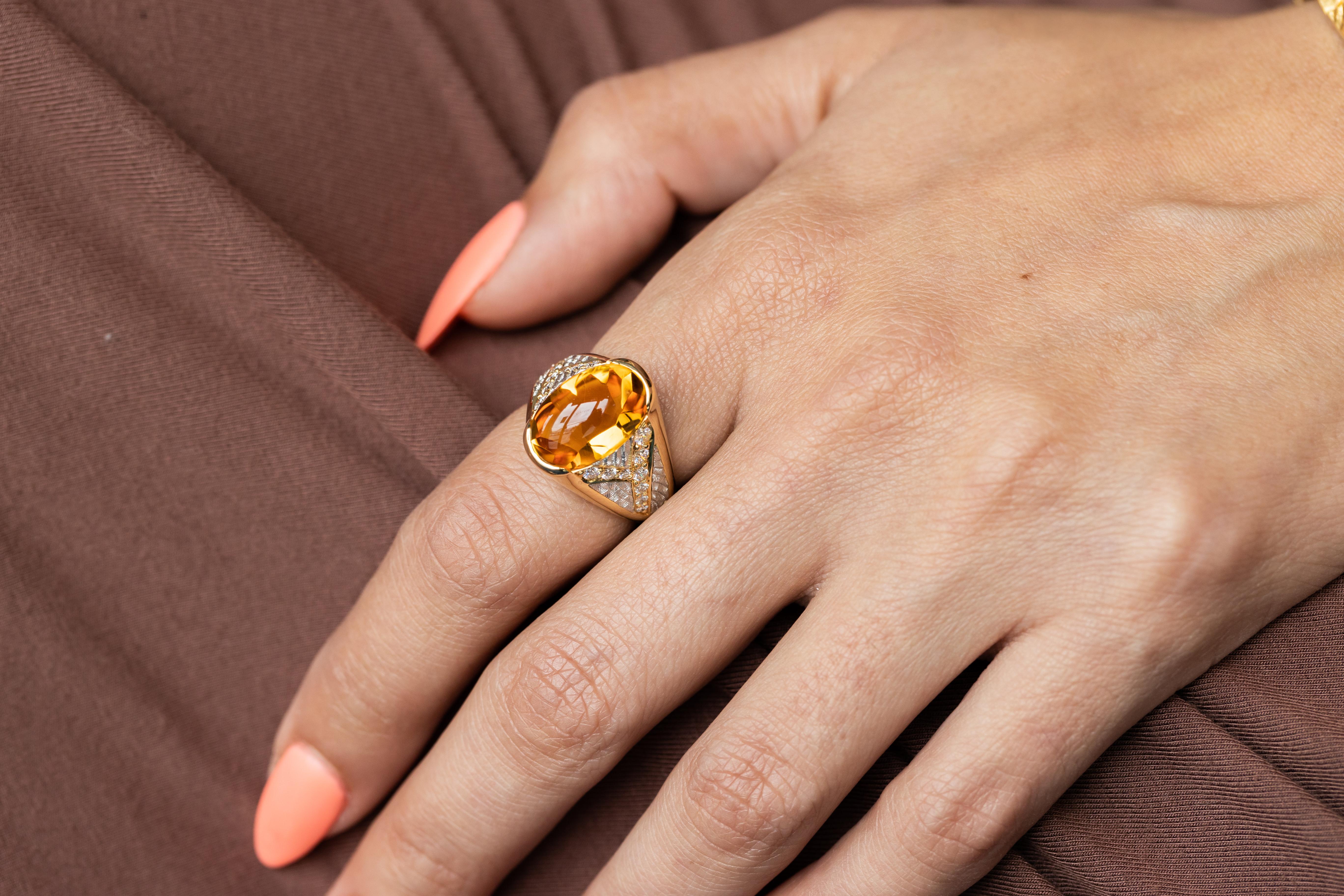 Indulge in the luxurious allure of the Venti Ring, a masterpiece crafted by the renowned designer Michael Bondanza. This stunning ring features a captivating 8.29-carat bufftop citrine, renowned for its radiant golden hue and exceptional clarity.