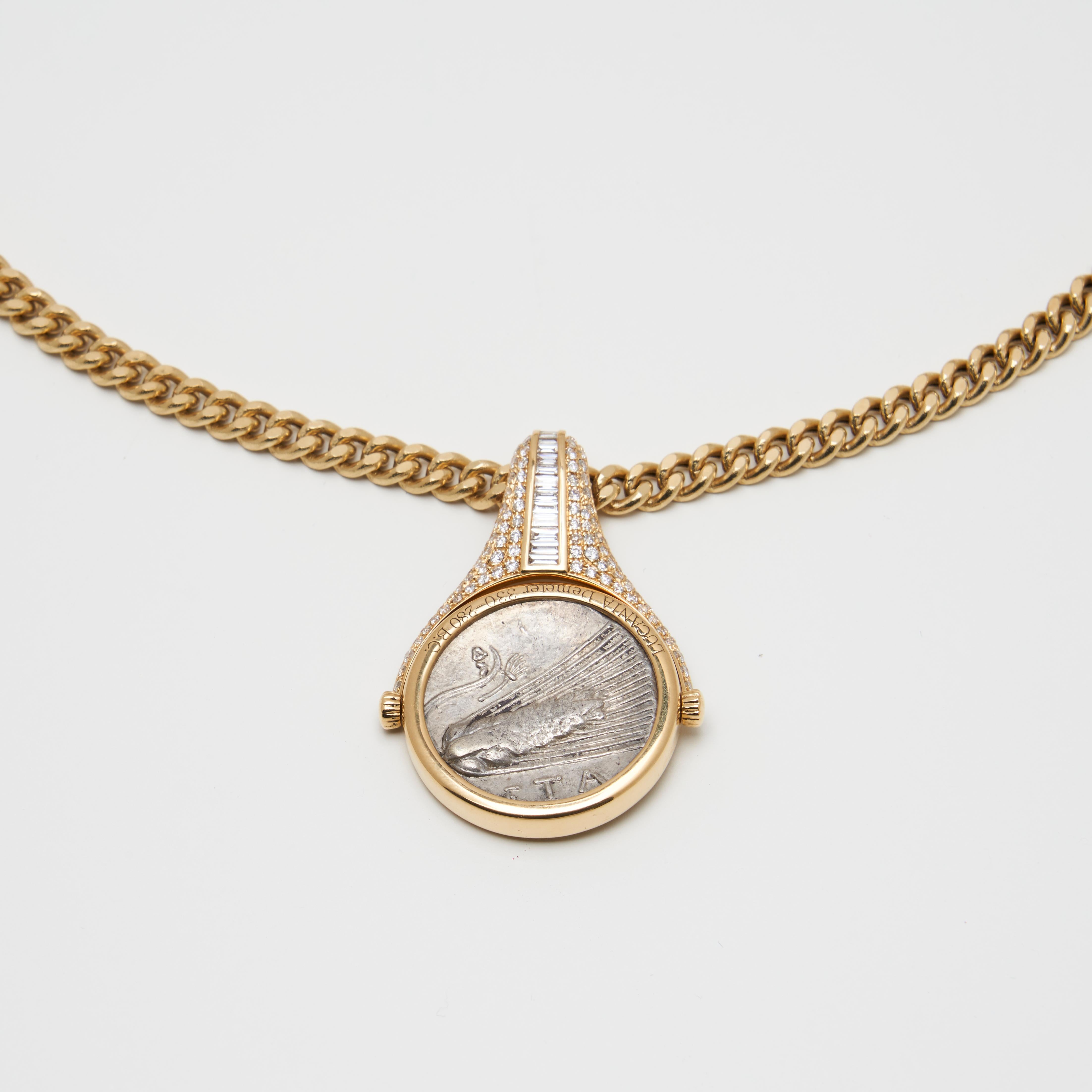 18-karat yellow gold
Ancient, authentic Greek silver coin center inset
Decorate with white diamonds 
Total weight is about 28.22g
Pendant Diameter: 35 mm*25mm
Pendant Thickness: 3mm 
Chain width: 4 mm
Chain length: 16 inches
Sold with certificate of
