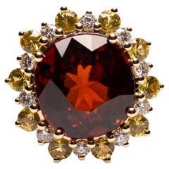 Bague en or 18 carats avec grenat rouge-orange de 11,65 carats, saphir jaune et diamants