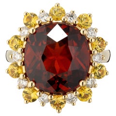 18K Gold Ring with 11.65 carat Red-Orange Garnet, Yellow Sapphire & Diamonds