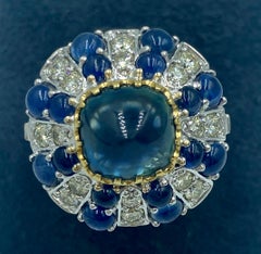 18k gold ring with no heat sugarloaf cabochon sapphire and diamonds