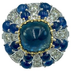 18k gold ring with no heat sugarloaf cabochon sapphire and diamonds