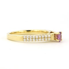 18k gold ring with pink sapphire and brilliant cut diamonds 0.26ct