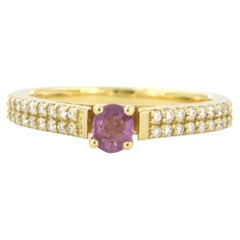 18k gold ring with pink sapphire and brilliant cut diamonds 0.26ct
