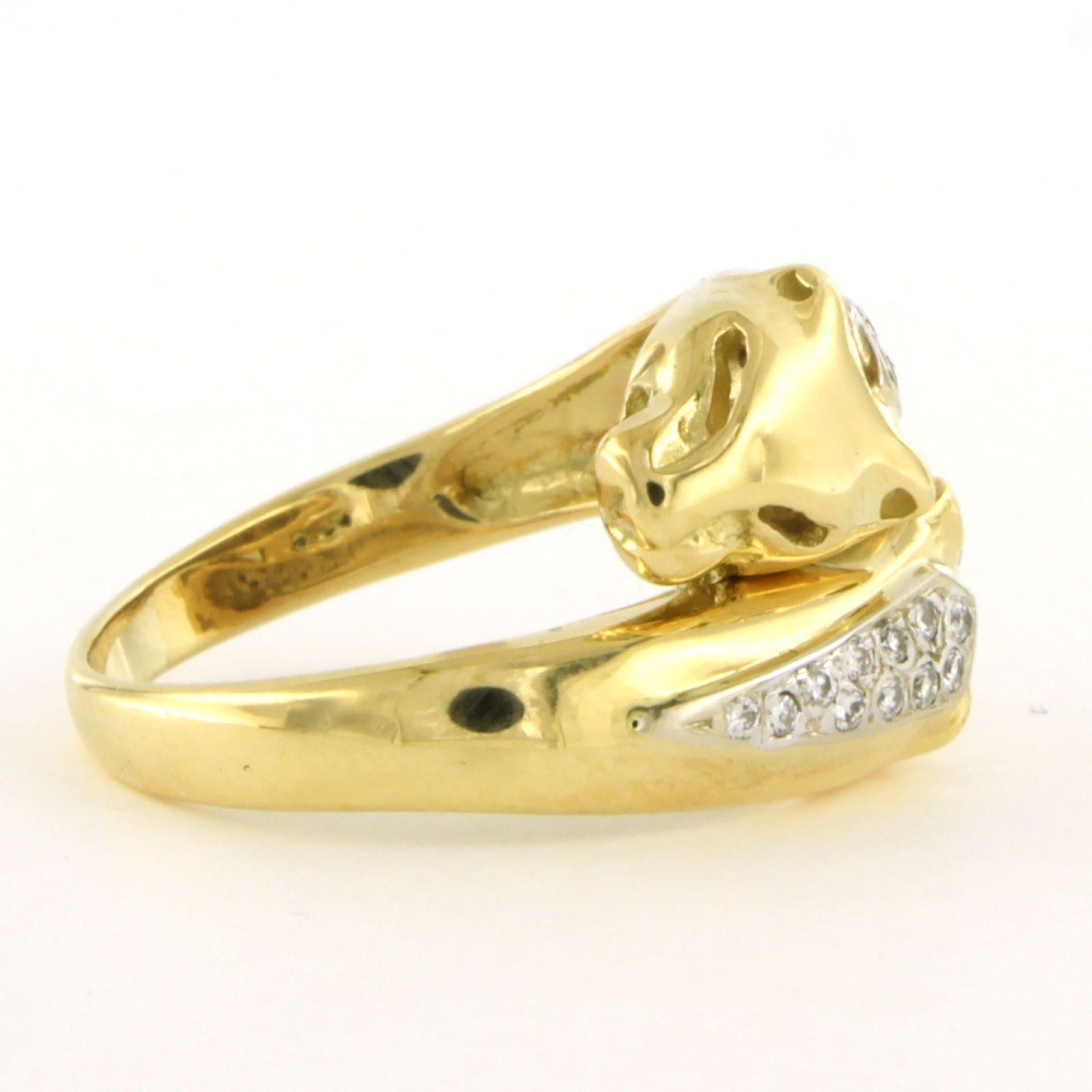 18k bicolor gold ring with two panther heads set with brilliant-cut diamonds up to 0.20ct – F/G – VS/SI – ring size US 7.25 – EU 17.5(55)

Detailed description

The top of the ring is 1.4 cm wide and 6.2 mm high.

Ring size US 7.25 – EU 17.5(55).