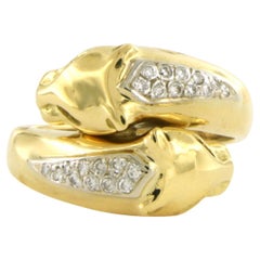 18k gold ring with two panther heads with brilliant-cut diamonds up to 0.20ct