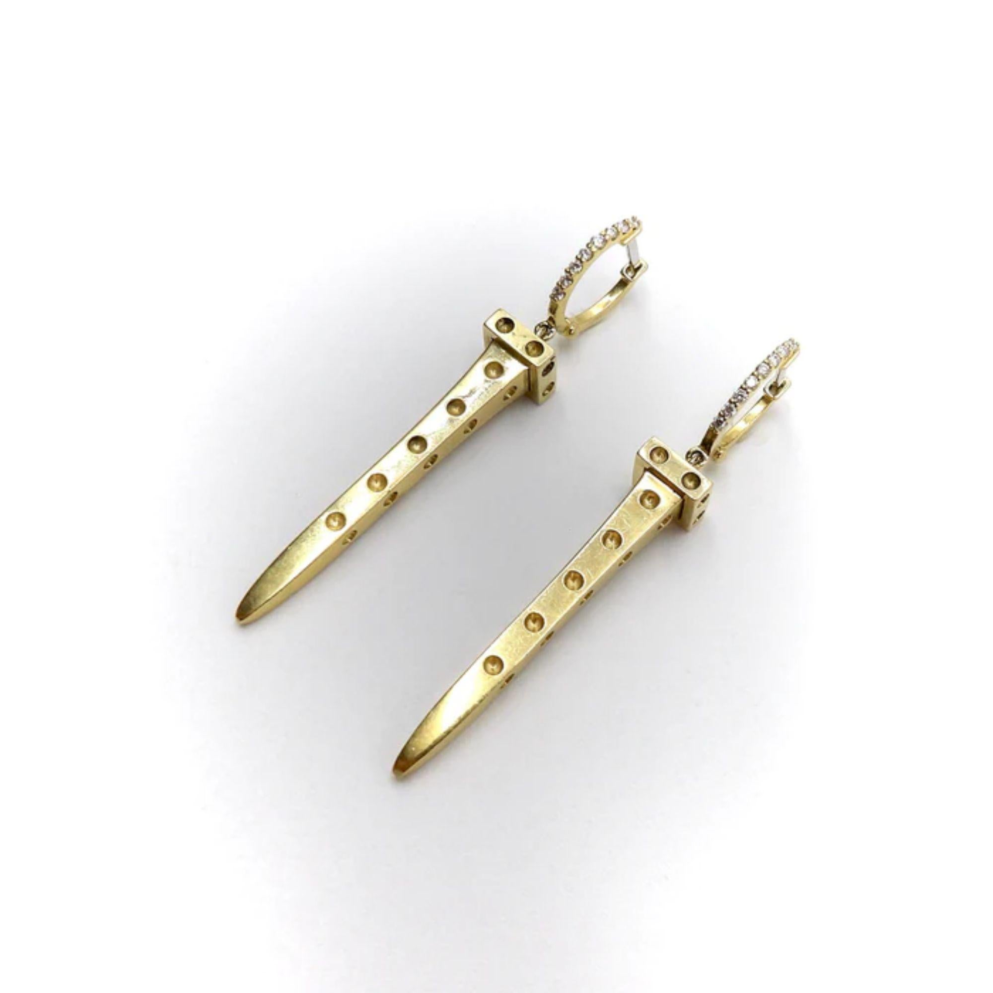 18K Gold Roberto Coin Nail Pois Moi Chiodo Earrings with Diamonds, circa 1990's
 
These stunning 18k gold and diamond pave earrings are designed by Roberto Coin, one of Italy’s most renown jewelry artisans. The earrings are hand etched and carved