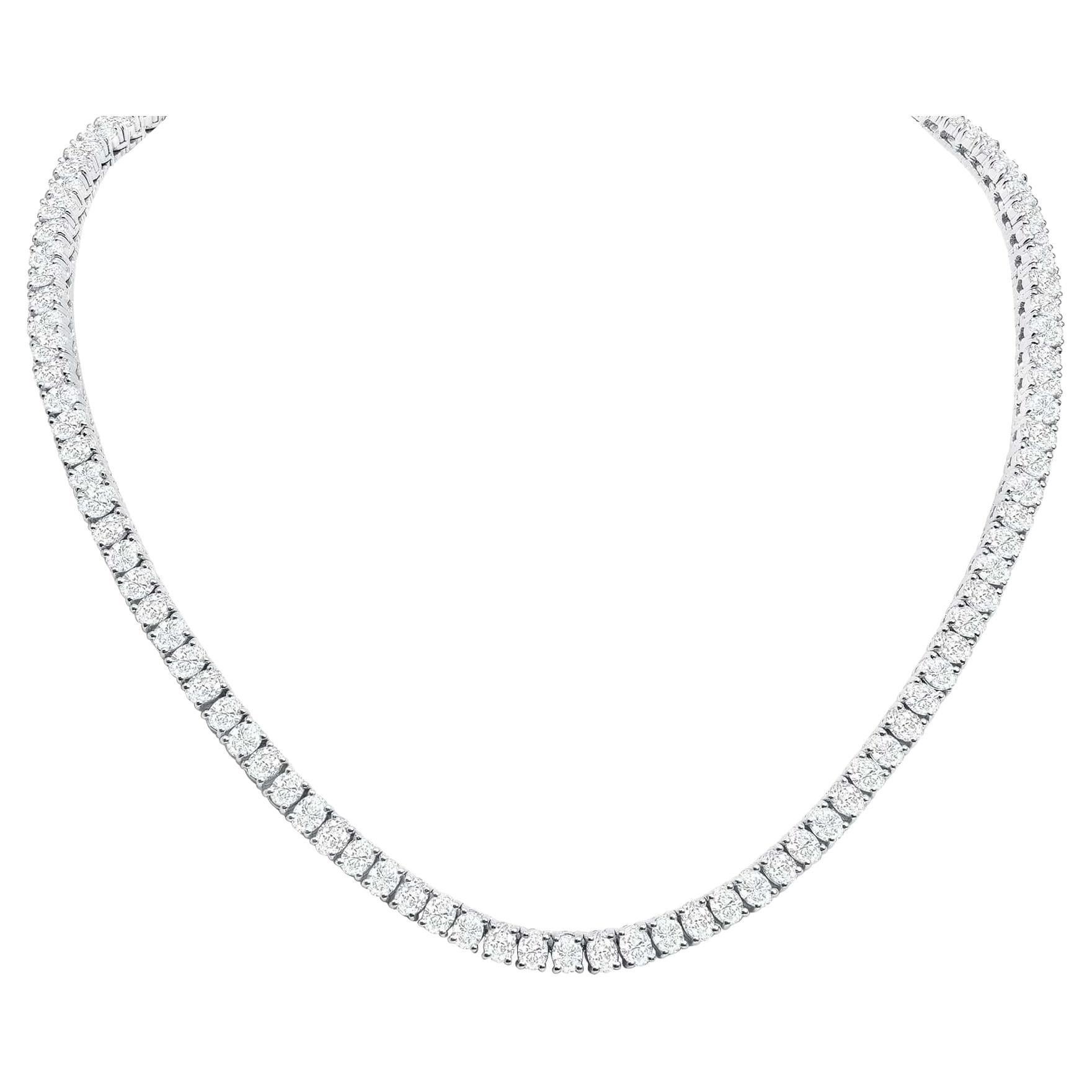 This diamond tennis necklace features beautifully cut oval diamonds set gorgeously in 18k gold.

Necklace Information
Metal : 18k Gold
Diamond Cut : Oval Natural Diamond 
Total Diamond Carats : 20ct
Diamond Clarity : VS -SI
Diamond Color : F-G
Size