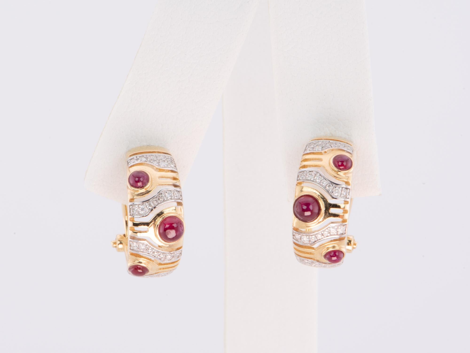 ♥ 18K Gold Ruby and Diamond Designer Earrings with Omega Clip Backing
♥ Each earring measures 15.4mm in length and 6.5mm in width

♥ Material: 18K Gold
♥ Gemstone: Ruby, 0.7ct; Diamond, 0.3ct