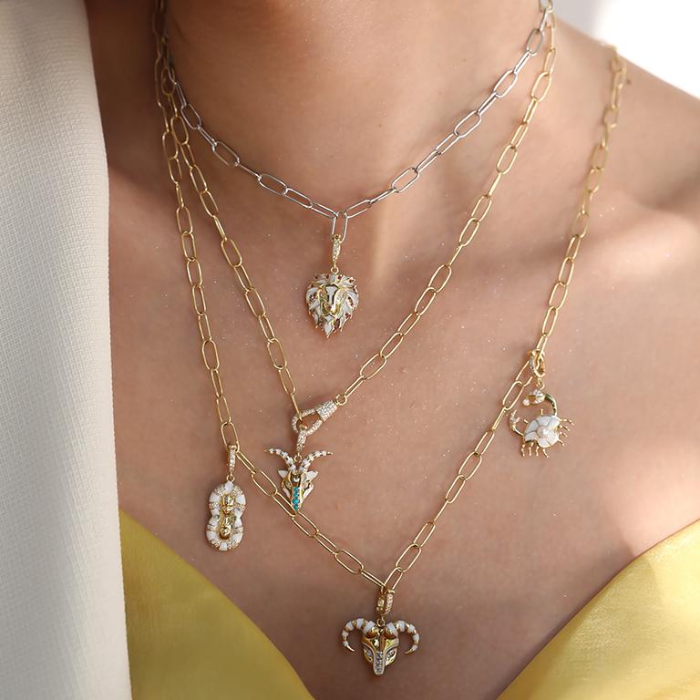 Contemporary 18K Gold, Ruby and White Diamond Lion Zodiac pendant For Sale