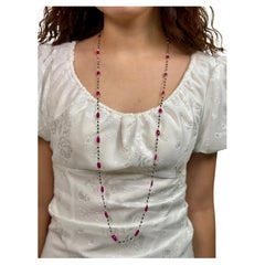 Collana di perle in oro 18k con rubino e diamante nero 11,48 carati