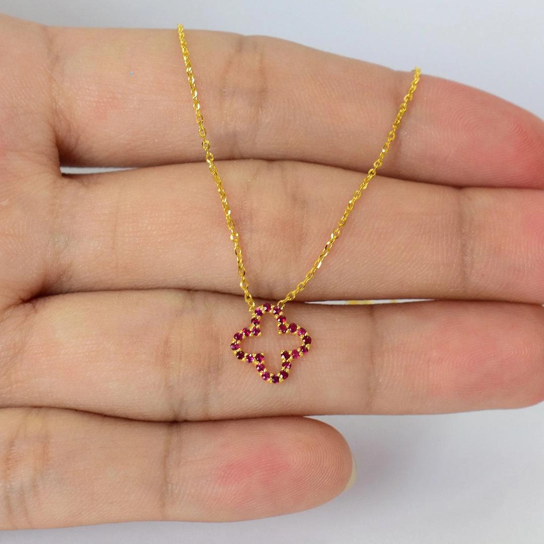 Ruby Clover Necklace is made of 18k solid gold available in three colors, White Gold / Rose Gold / Yellow Gold.

Beautiful little minimalist necklace is adorned with natural AAA quality Ruby Gemstones. Perfect for wearing by itself for a minimal