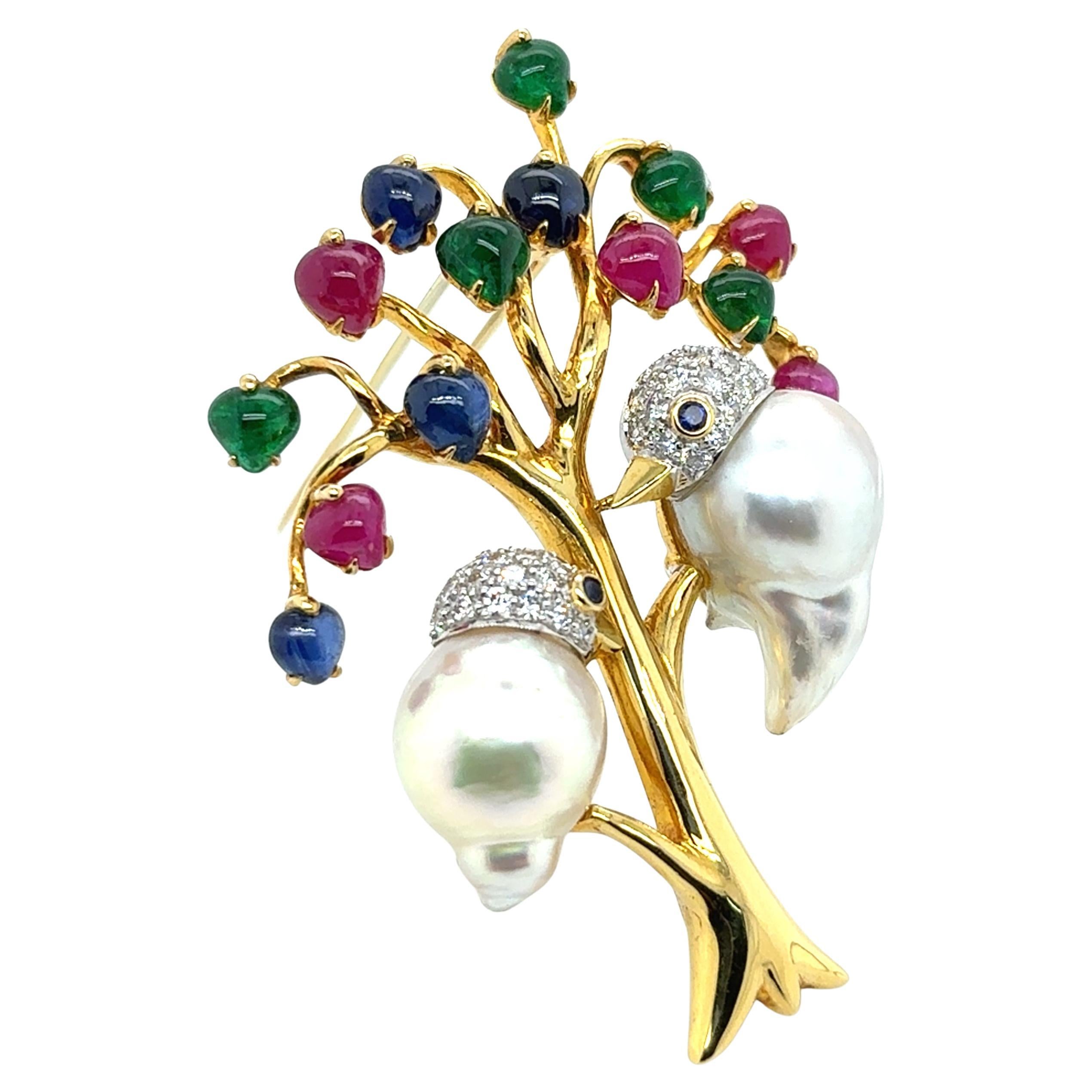 Spilla a forma di uccello in oro 18k con rubino, smeraldo, zaffiro e perle di diamante