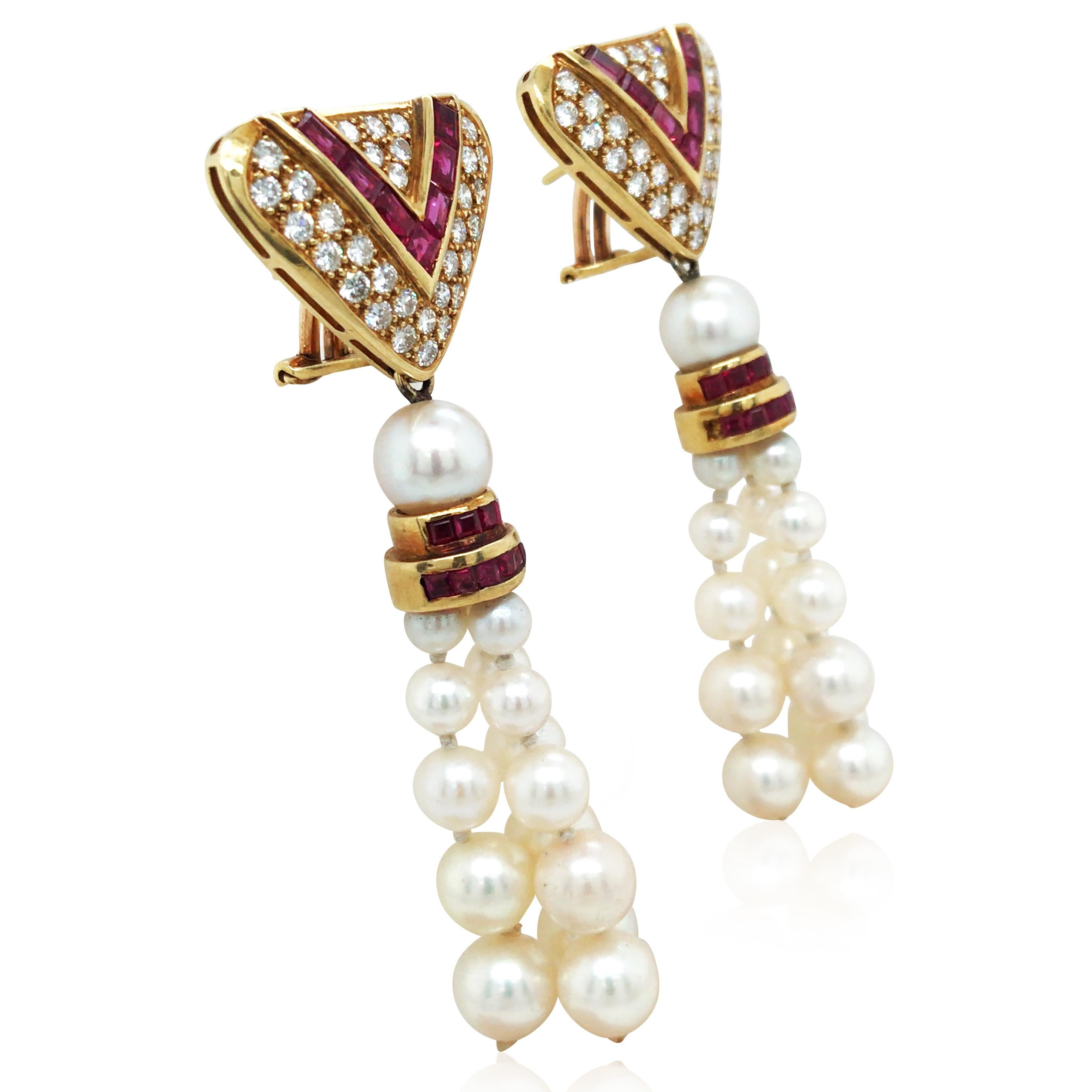 These earrings beautifully combine the vibrant color of rubies with the brilliance of diamonds, showcasing both fashion and elegance. The unique luster of the pearls complements the vivid hue of the rubies, while the sparkling diamonds add a touch