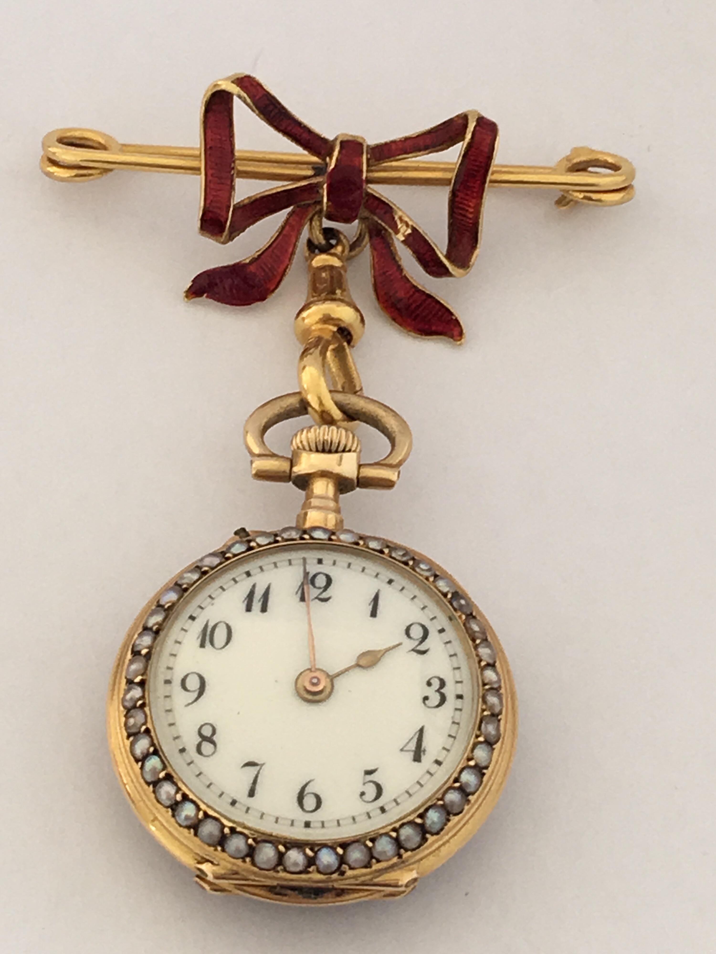 
This beautiful Victorian period Ladies Brooch Fob watch is in good working condition. And ticking nicely. the enamel on the bow has visible chipped and very fine scratches on the enamel top cover case as worn by aged.