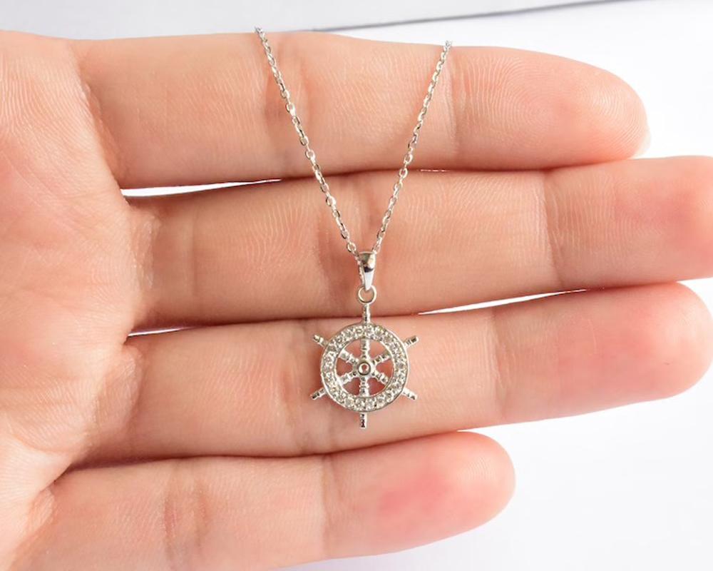 Ship Wheel Necklace with micro pave natural diamond is made of 18k solid gold.
Available in three colors, White Gold / Rose Gold / Yellow Gold.

Lightweight and gorgeous natural genuine round cut diamond. Each diamond is hand selected by me to