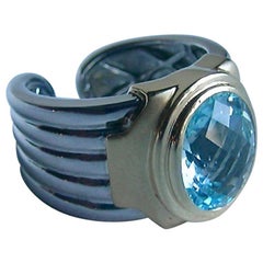 Bague en or 18 carats, argent et topaze bleue de 5,55 carats