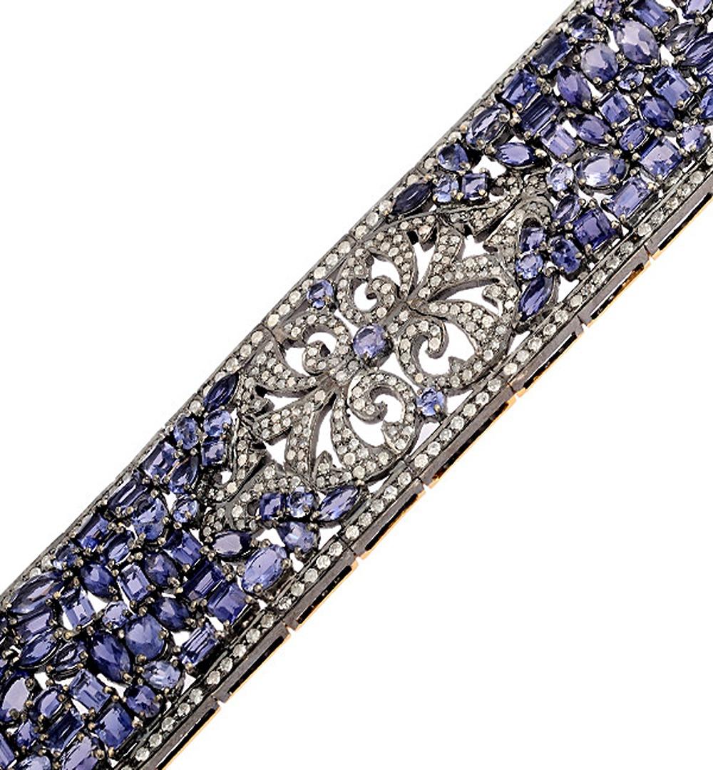 18k:12.46g,
Diamond:5.43ct,
Silver:60.01g
IOLITE:36.25Cts
Size: 190X30 MM