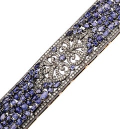 Bracelet en or et argent 18 carats avec iolite mélangée et diamants pavés dans une monture en forme de fleur