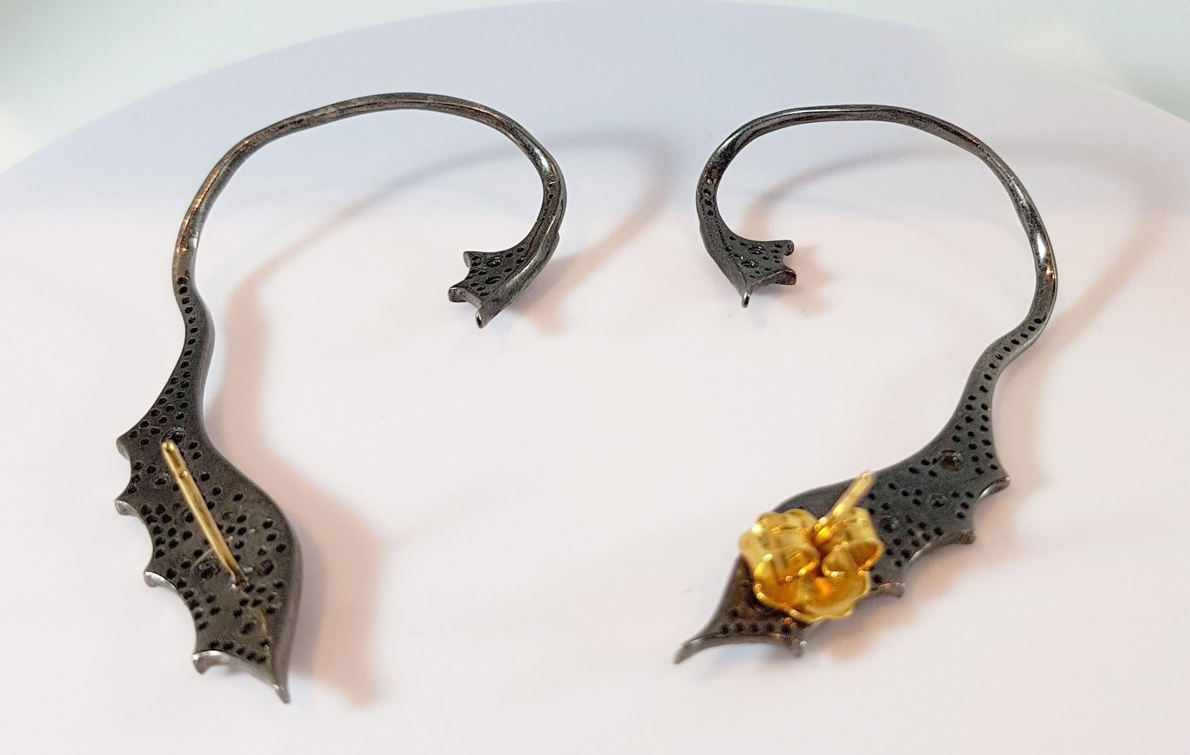 Contemporary 18 Karat Gold and Silver Dragon Cuff Earrings with Diamonds and Yellow Saphires For Sale