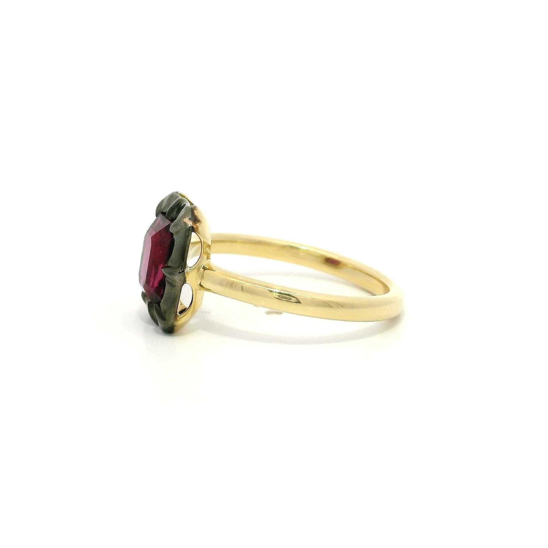 --Stone(s):--
(1) Natural Genuine Ruby - Emerald Cut - Collet Set - Purplish Red Color - Heated - 1.53ct (exact)
** See Certification Details Below for Complete Info **

Material: Solid 18k Yellow Gold w/ Blackened Silver Top
Weight: 3.45 Grams
Ring