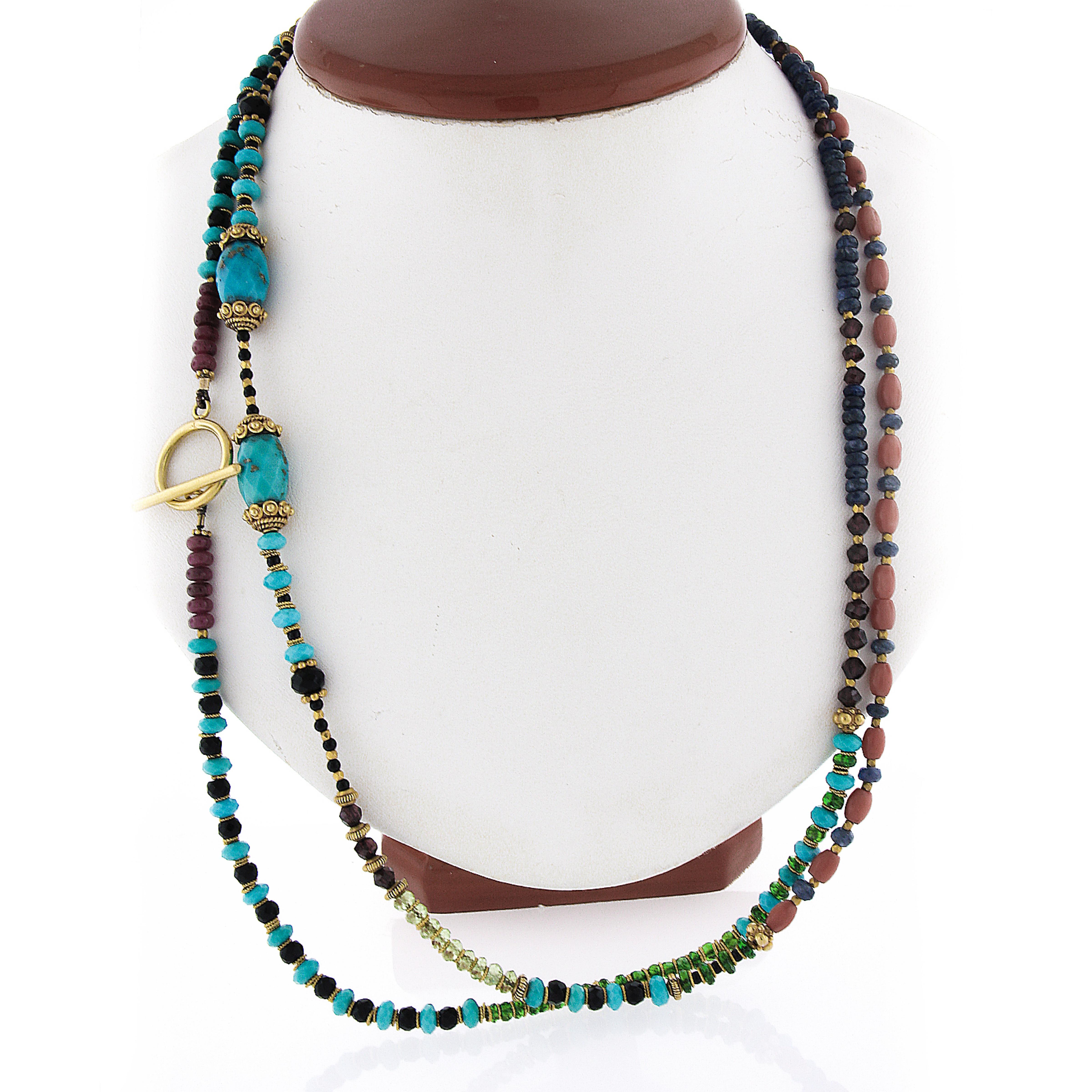 --Stone(s):--
Numerous Natural Genuine Multicolor Stones - Rondell & Faceted Beads Shape - Blue, Green, Black, Orange & Red Colors

Material: String w/ Solid 18k Yellow Gold Beads, Spacers, Caps & Toggle Clasp
Weight: 50.52 Grams
Chain Type:
