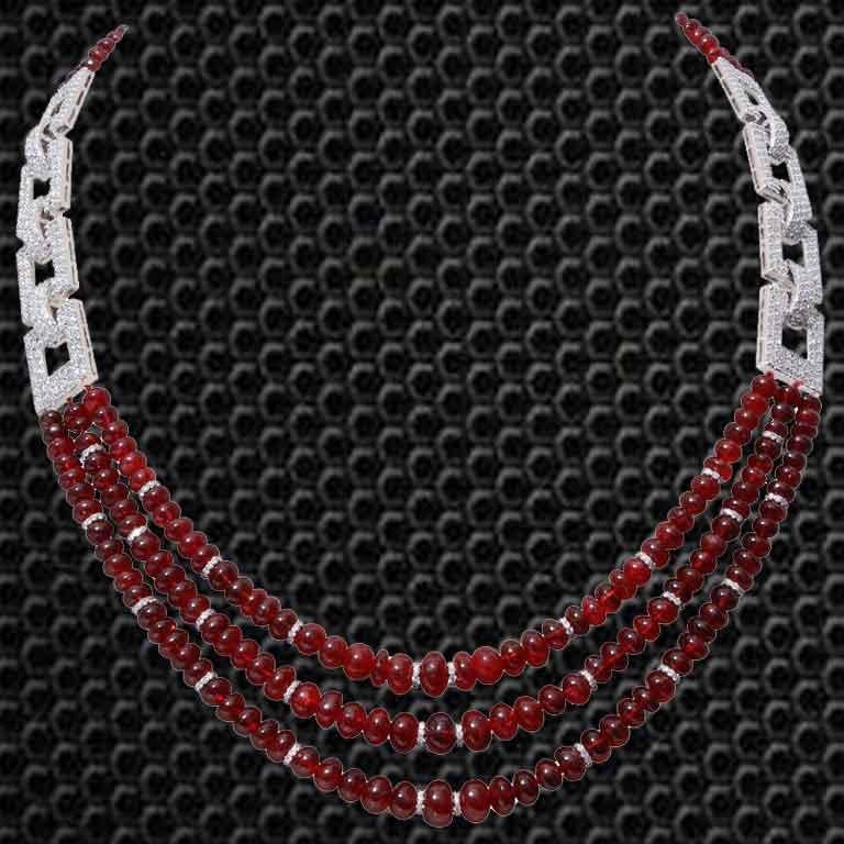 A multi strand Spinel Necklace, which consist 247.18 carats spinels and includes 9.92 carats Round White Diamonds. The necklace is made in 18K White Gold and weighs approximately 40.890 grams. The clasp is also made of 18K Gold.