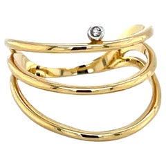 18K Gold Spiralring mit Diamant-Akzent