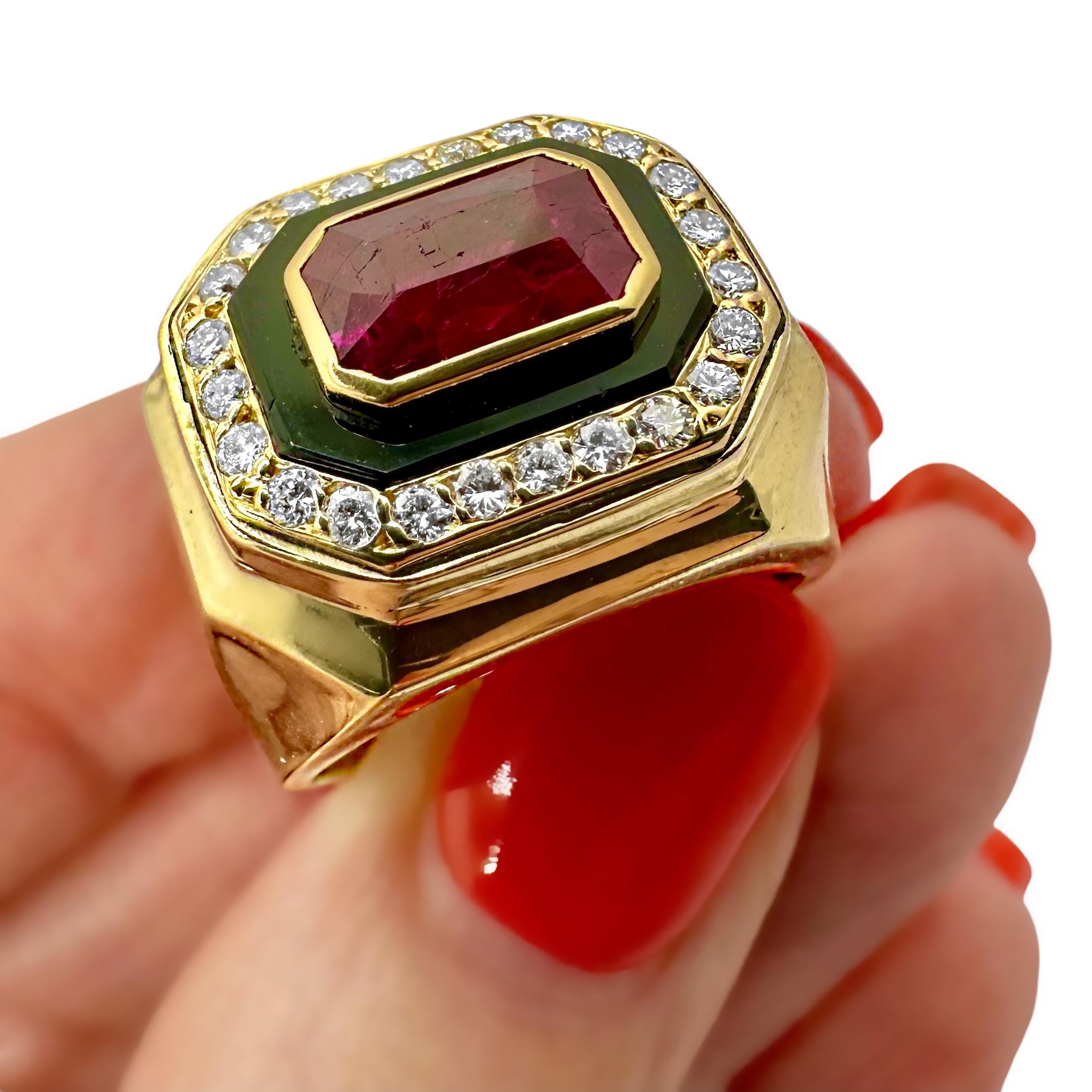 This striking custom made 18k yellow gold cocktail ring is bezel set with one center transverse mounted Mozambique ruby, having a total approximate weight of 2.00ct*. Fine rubies are among nature's very rarest of gems, and those that have not been