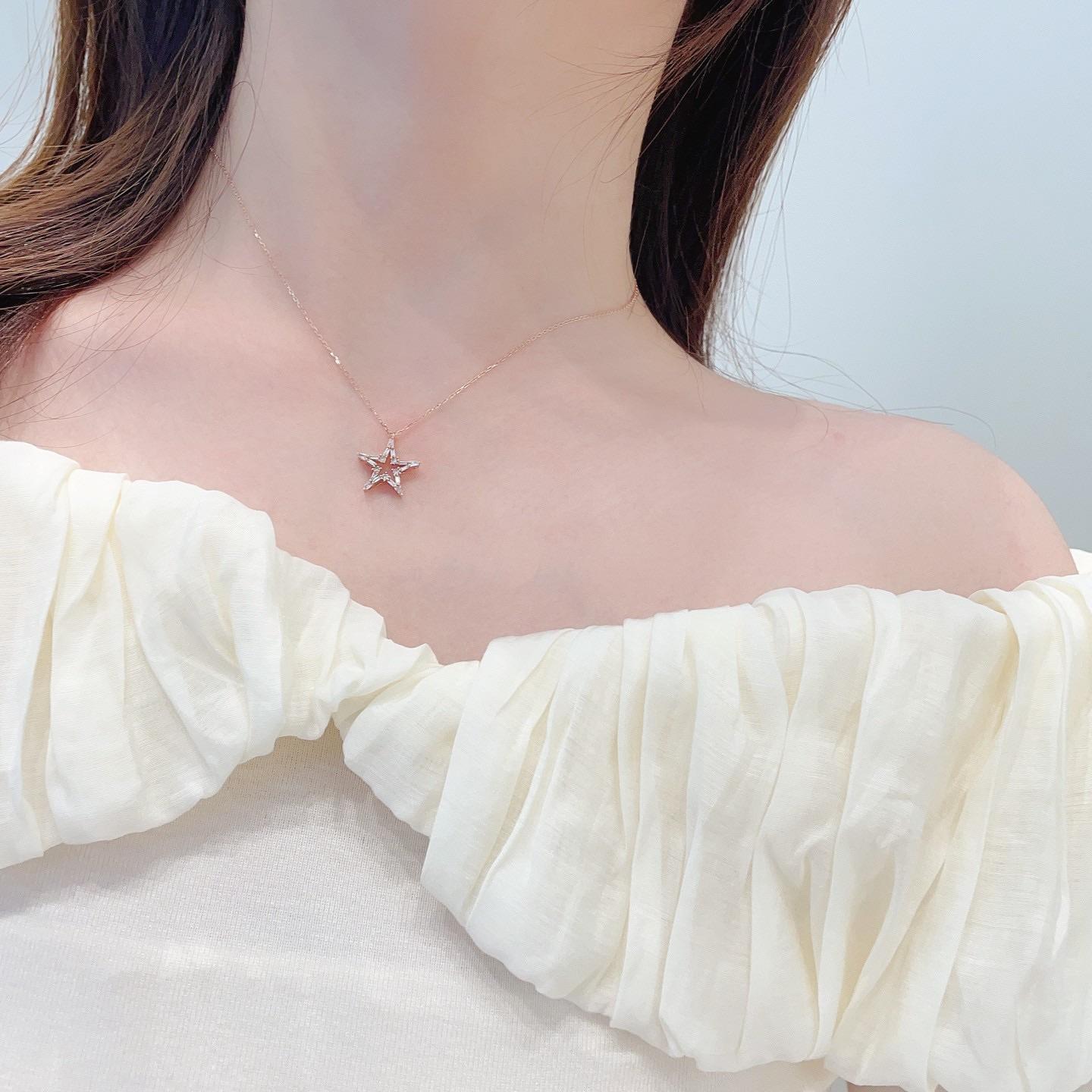 Inspired by the mysteries of the cosmos, this meticulously crafted 18K gold pendant features a dimensional pentagram motif with a stepped geometric design. At its center shines a precision-cut 0.09ct natural diamond (G-H/VS clarity), surrounded by a