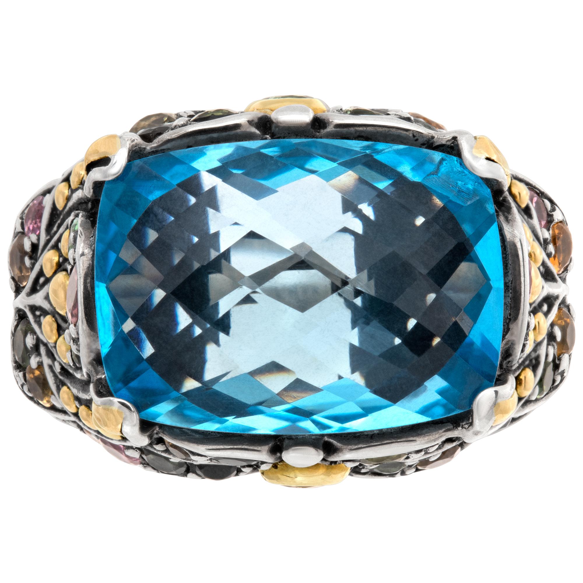 Designer signed BJC over 8 carats rectangular faceted brilliant cut blue topaz & multi color round brilliant cut tourmalines, set in 18K & sterling silver ring. 20 w x 16 mm h. Size 7.This Topaz ring is currently size 7 and some items can be sized