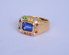 18K gold Tanzanite ring with sapphires and diamonds
