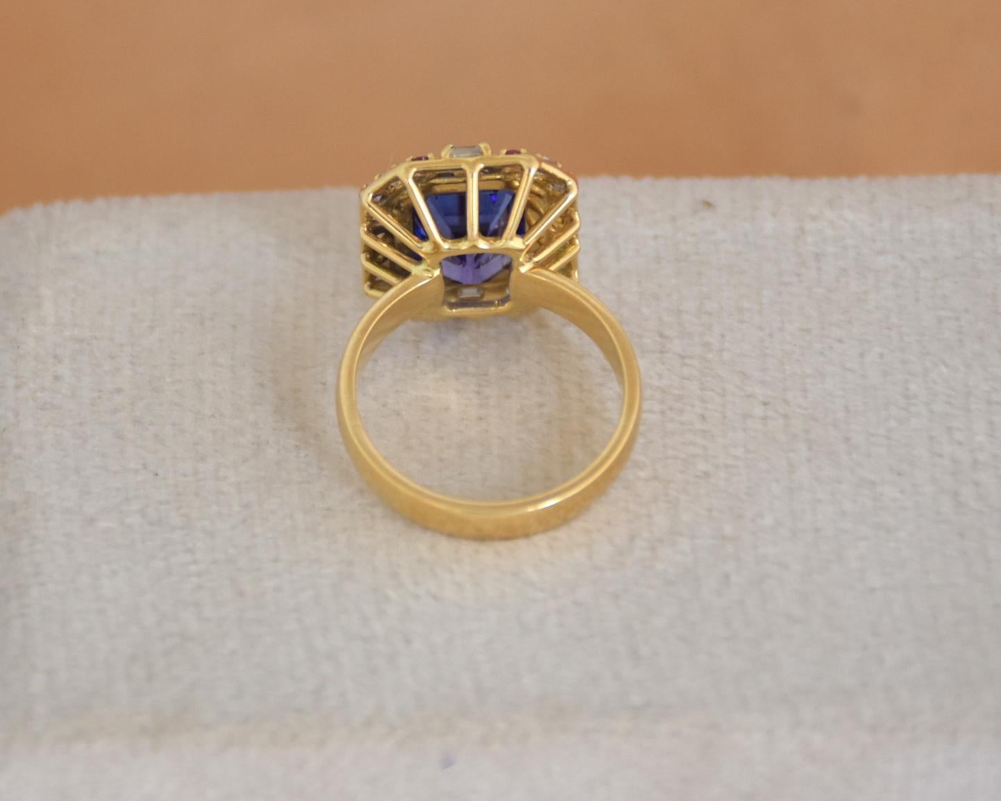 Women's or Men's 18K gold Tanzanite titanic stone ring with multi sapphires and diamonds