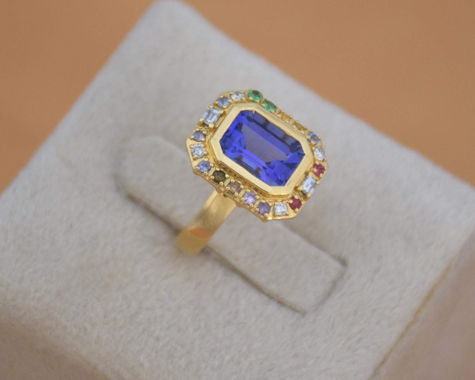 18K gold Tanzanite titanic stone ring with multi sapphires and diamonds 1