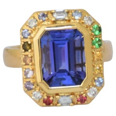 18K gold Tanzanite titanic stone ring with multi sapphires and diamonds