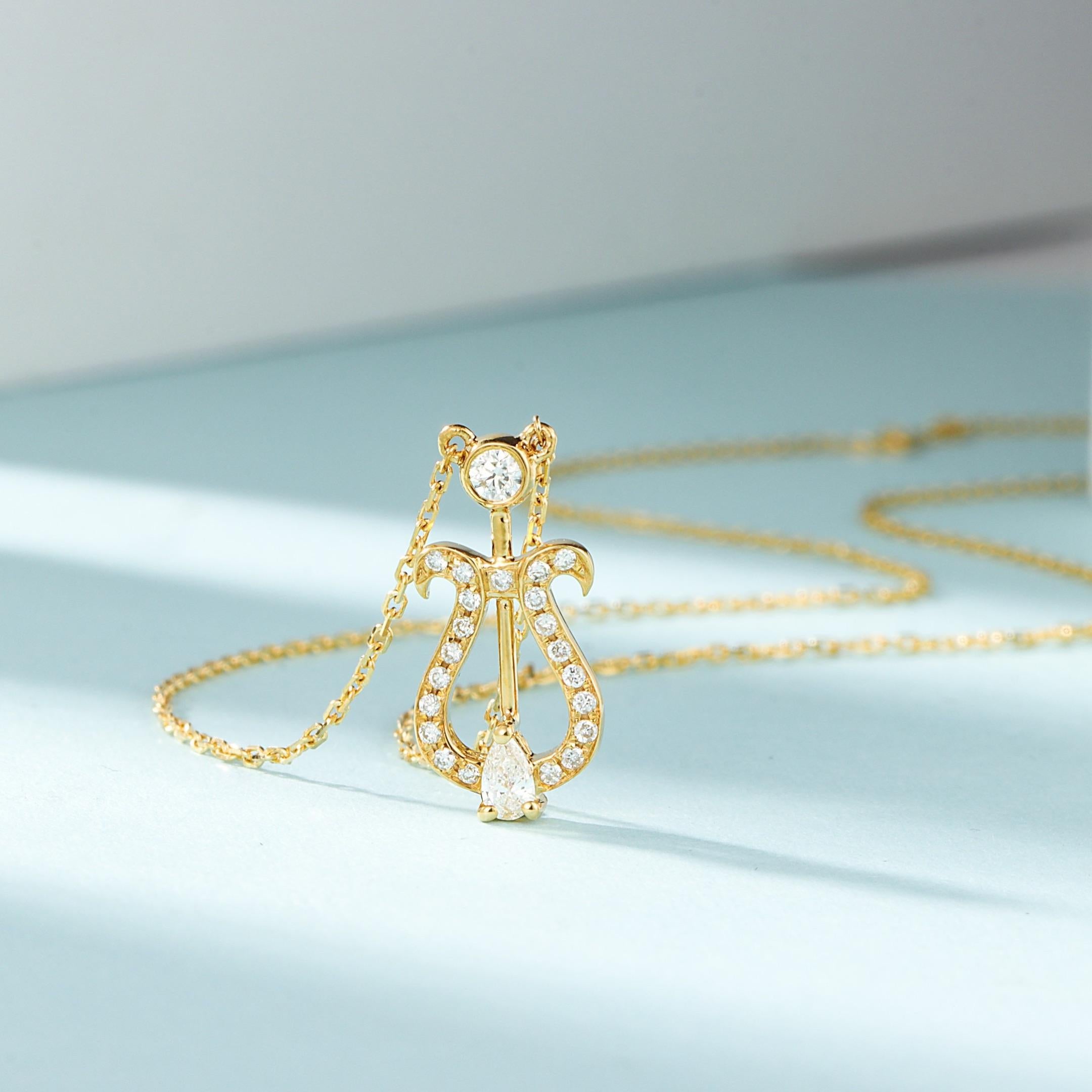 Brilliant Cut 18K Gold Teardrop Bubble Lyre Necklace with Natural Diamonds For Sale