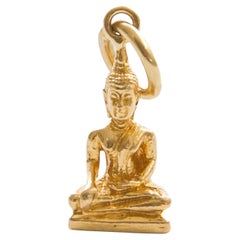 Ciondolo buddista tibetano in oro 18K