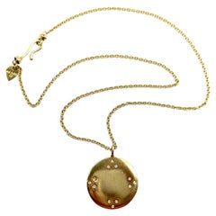 Pendentif miroir tibétain en or 18K avec diamant et chaîne par Me & Ro