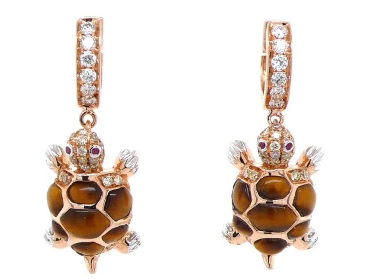 18K Gold Tiger Eye Stone Turtle Earrings with Diamonds

12 Diamonds - 0.23 CT
54 Fancy Diamonds - 0.32 CT
4 Rubies - 0.02 CT
14 Tiger Eye Stone - 1.21 CT
18K Rose Gold - 6.73 GM