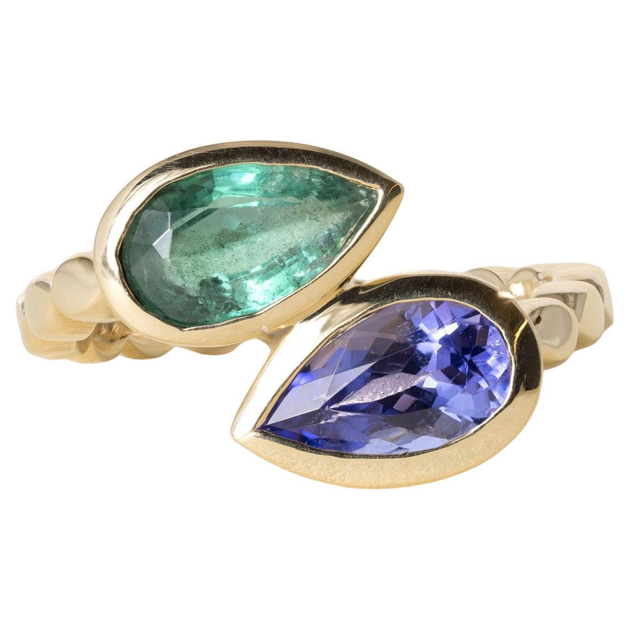 Bague en or 18K Toi et Moi Emeraude et saphir en forme de poire